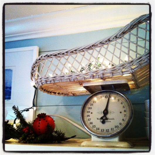 Last year, I filled my antique baby scale with lights... simple and easy. Let the antique do most of the "talking"! 