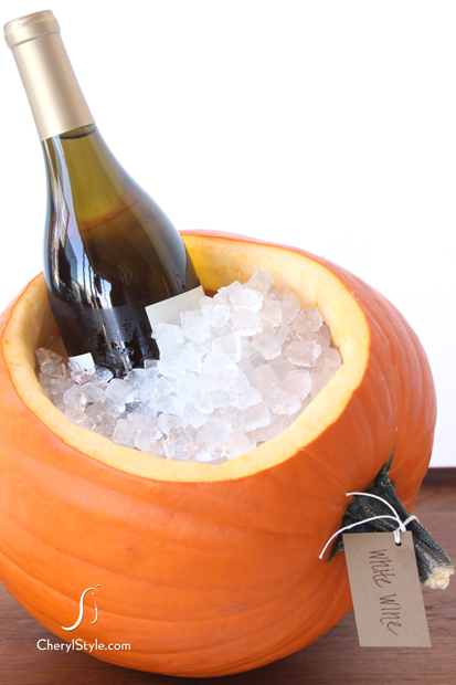 I don't know about you, but I definitely have month-old pumpkins on my porch still.(Hey- they're good through Thanksgiving!) Well, turn one or two into a festive ice bucket! 