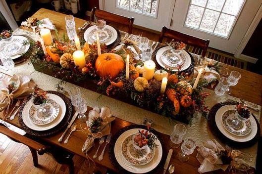 This is your traditional orange, brown, and yellow table done in a classically elegant way. It just exudes warmth and totally feels like a harvest feasting table.
